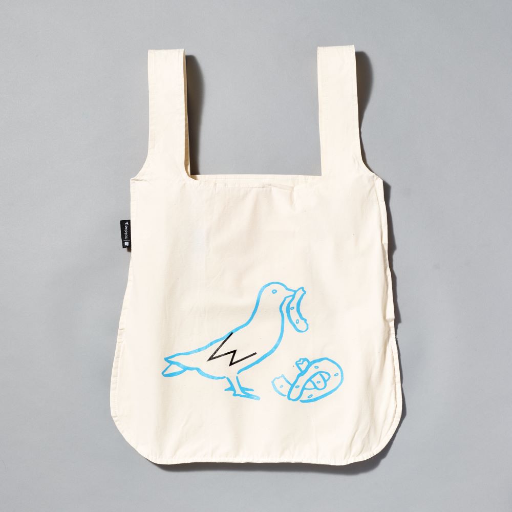 17" x 25" rip-stop nylon white Whitney Notabag Bag and Backpack with blue pigeon eating pretzel illustration by Tamara Shopsin