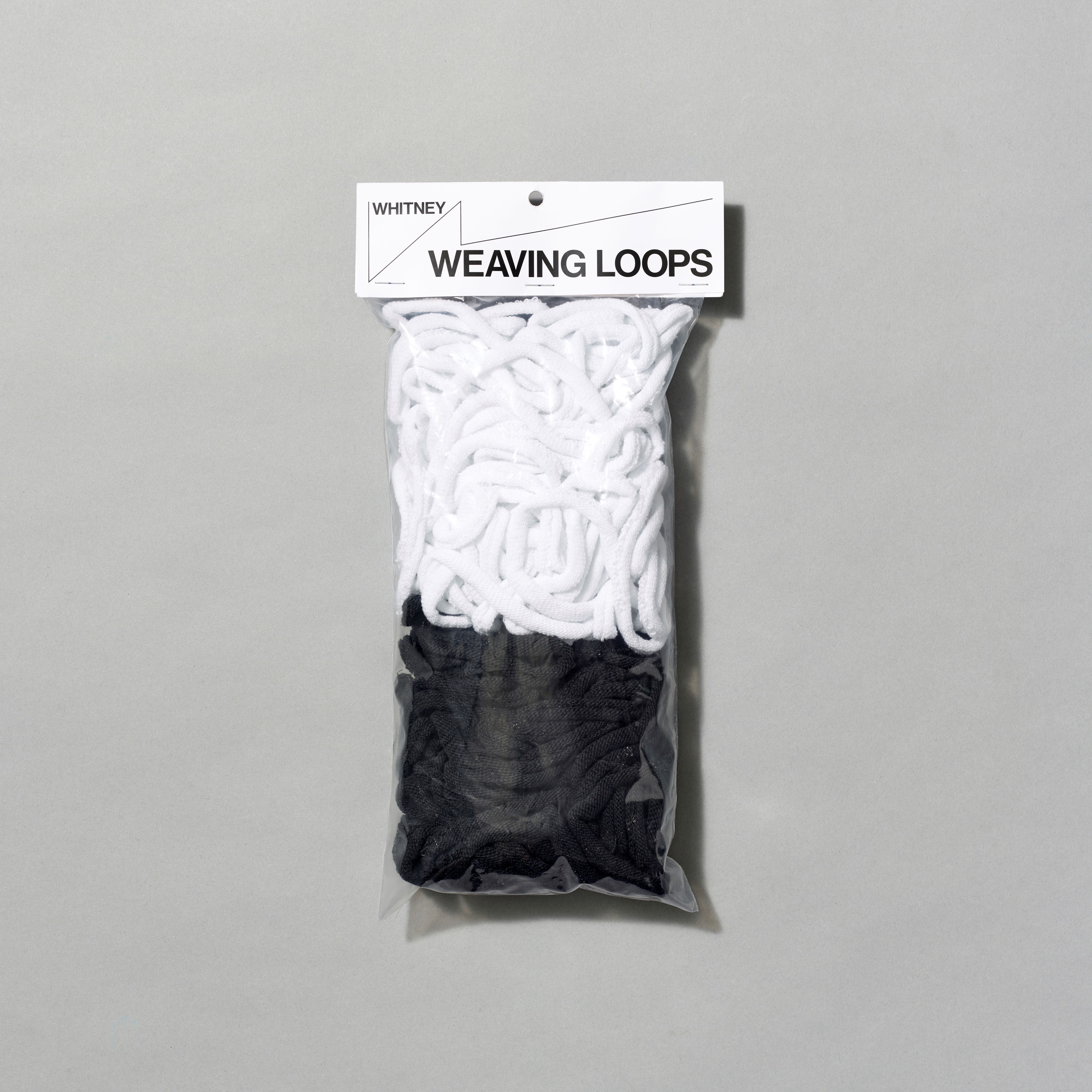 Bag of white and black weaving loops