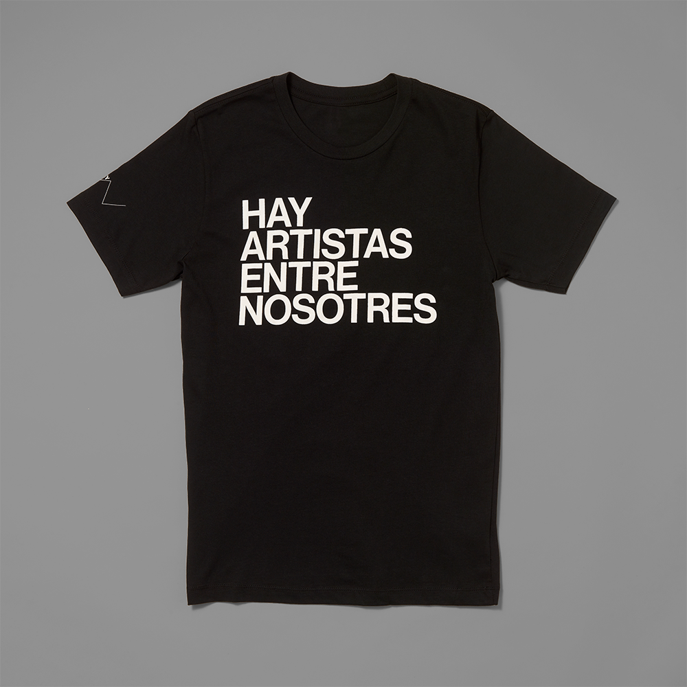 100% cotton black t-shirt with Hay Artistas Entre Nosotres screen printed in white text