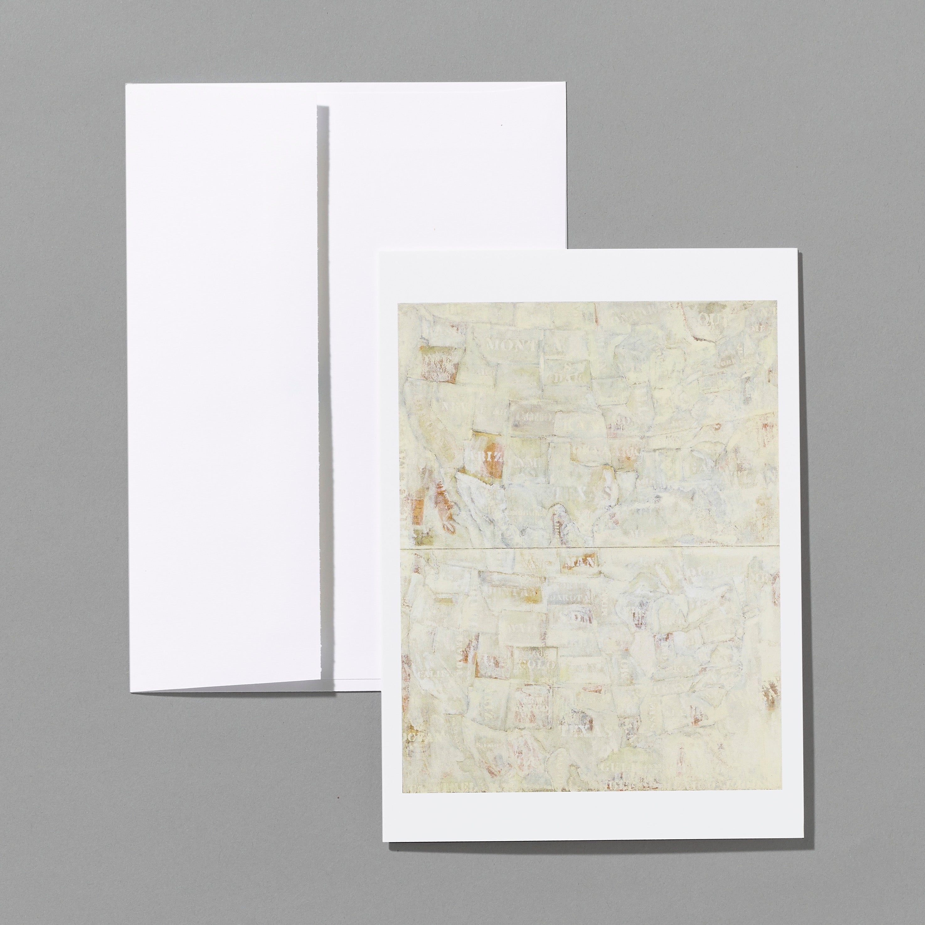 Notecard featuring Jasper Johns' Two Maps artwork and white envelope on a gray background