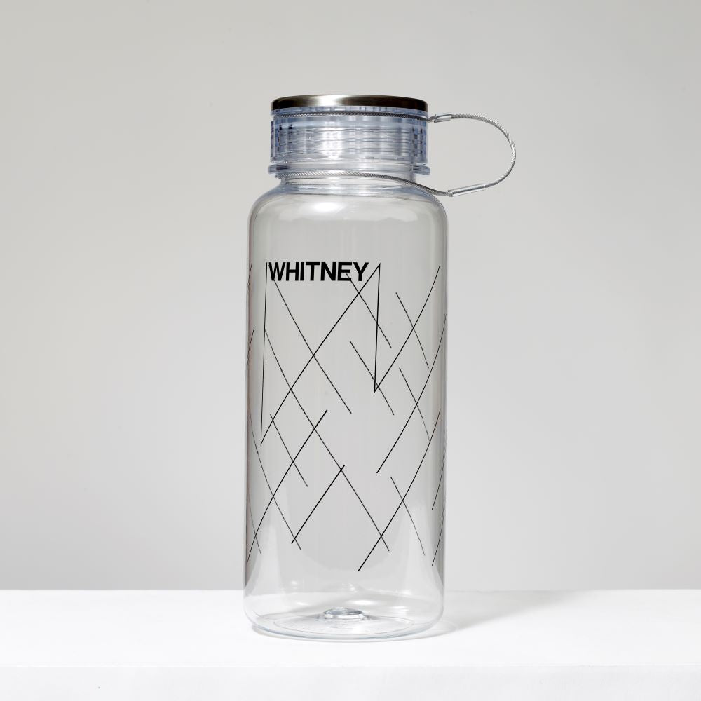 Acrylic Whitney clear travel bottle with the Whitney logo and W's on the front and back. Holds 33 oz. liquids.