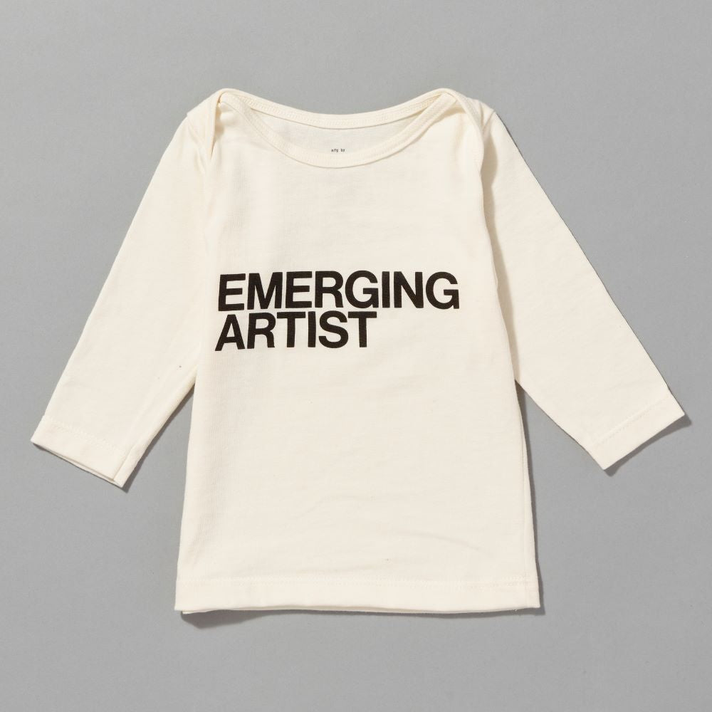 100% certified organic cotton white baby t-shirt with "Emerging Artist" written in black text on the front
