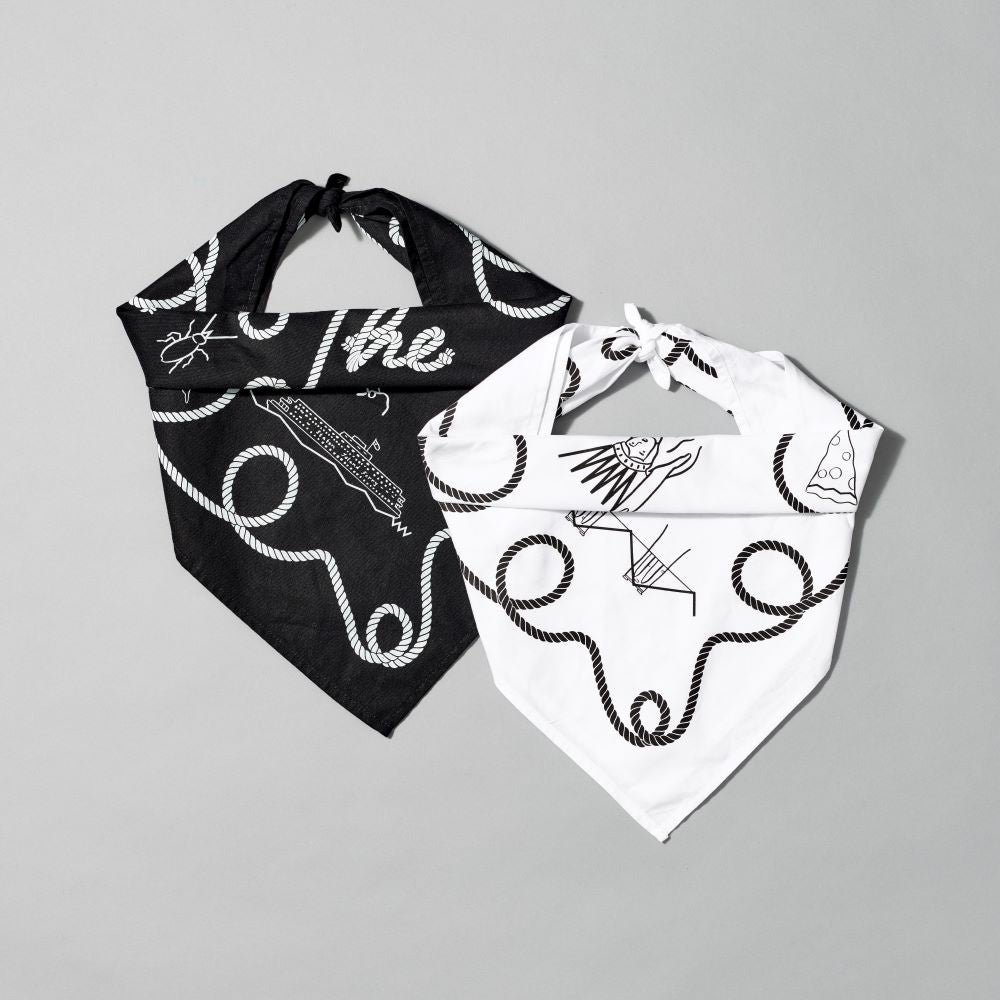 100% cotton, 23" x 23" folded black and white bandanas with illustrations by Tamara Shopsin