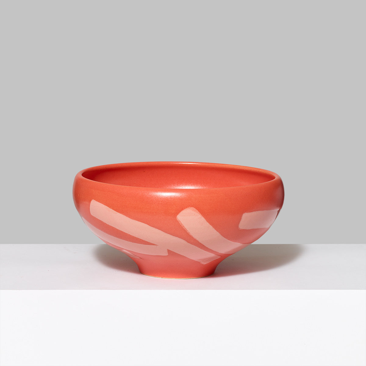 Handmade ceramic with glaze serving bowl in coral. Measures 6" Diameter x 3.25" Tall. 