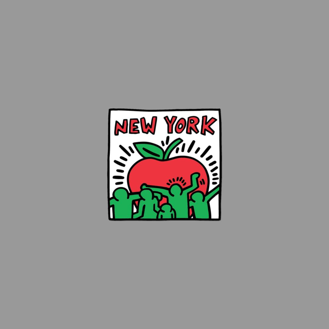 Sticker from Keith Haring of a red apple with people around it and 'New York' text on a gray background