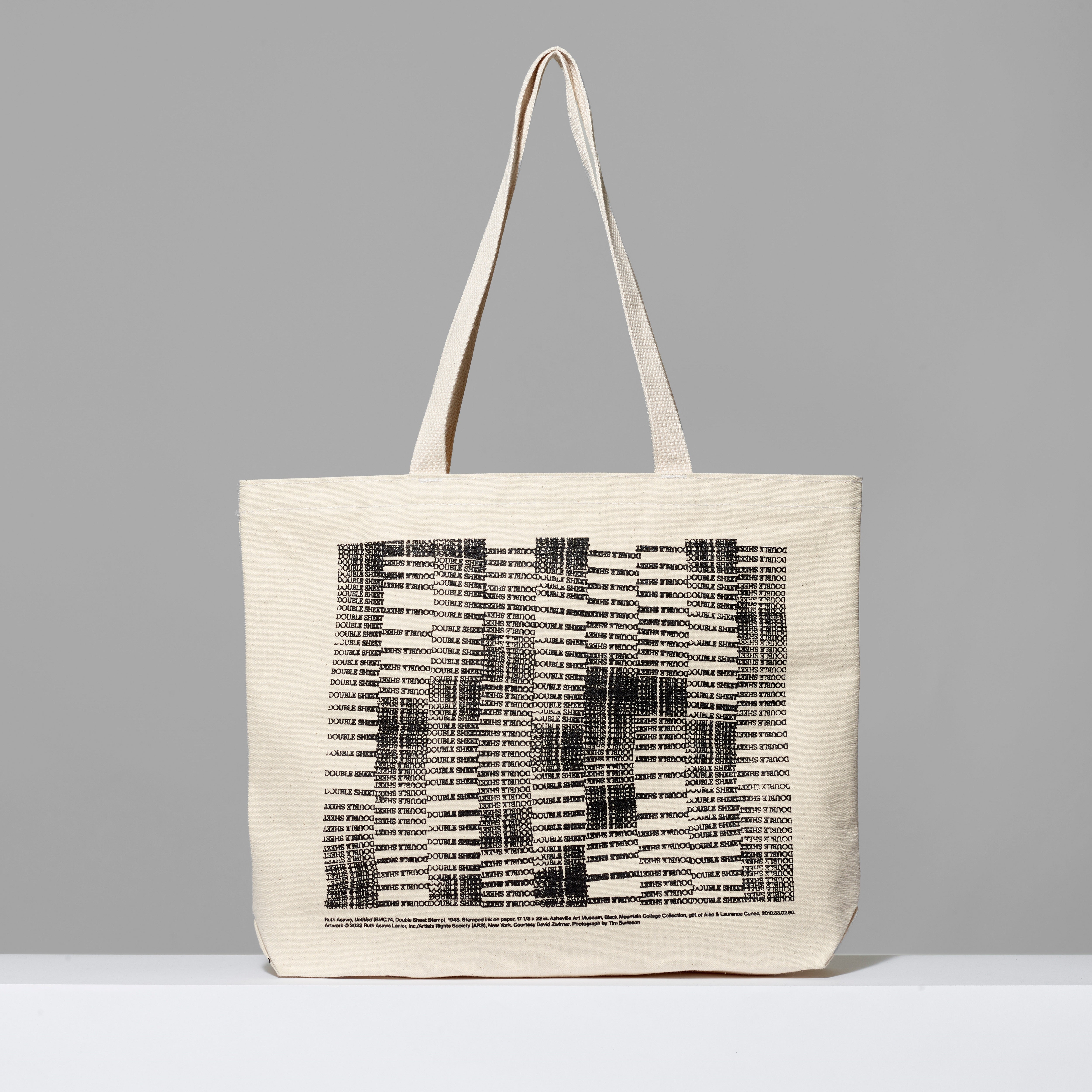100% cotton Ruth Asawa Through Line Tote featuring Untitled (BMC .74 Double Sheet Stamp). Measures 18" x 14". 3.5" gusset, 11" handles.