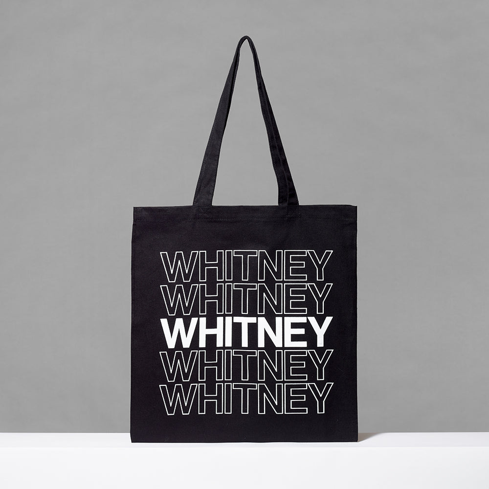 100% cotton black tote with Whitney in white text screen printed five times across