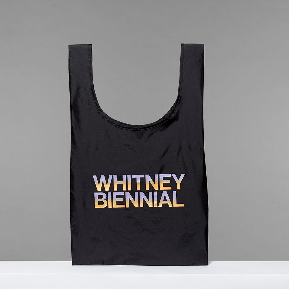 100% recycled nylon black Whitney Biennial 2024 Tote with Whitney Biennial screen printed in a purple and orange gradient. Measures 15.75" x 15.5", 8" handles