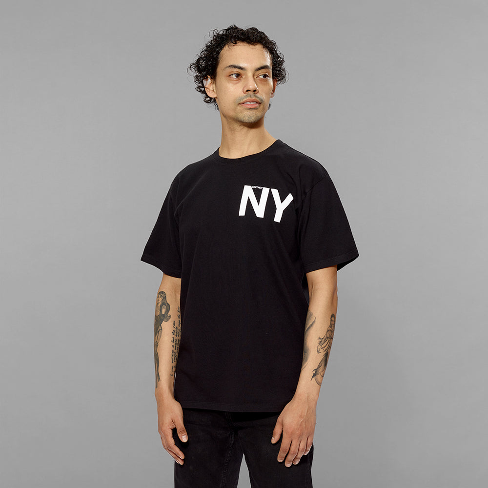 Model wearing 100% cotton black t-shirt with NY and Whitney screen printed in white