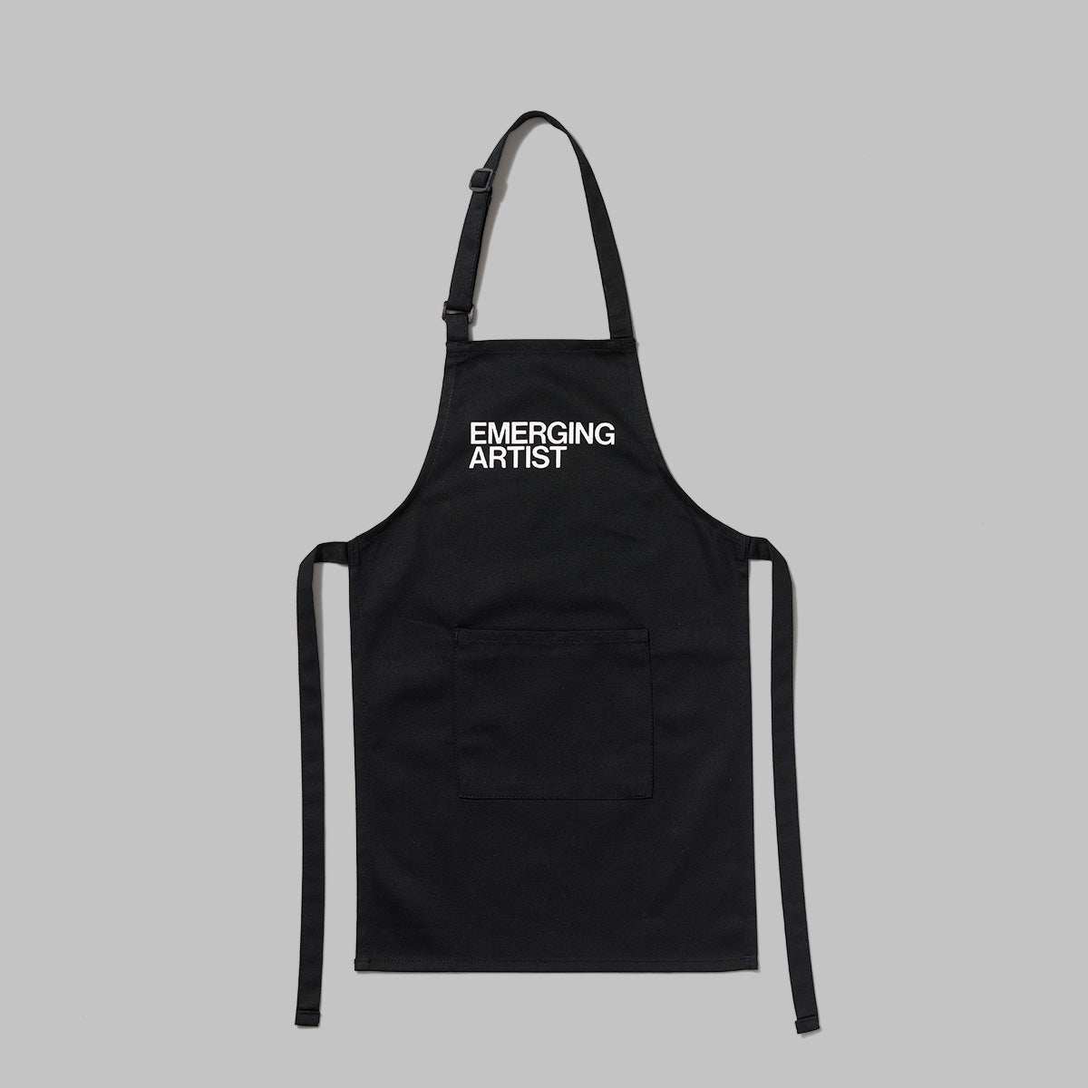 100% cotton black apron with Emerging Artist screen printed in white text