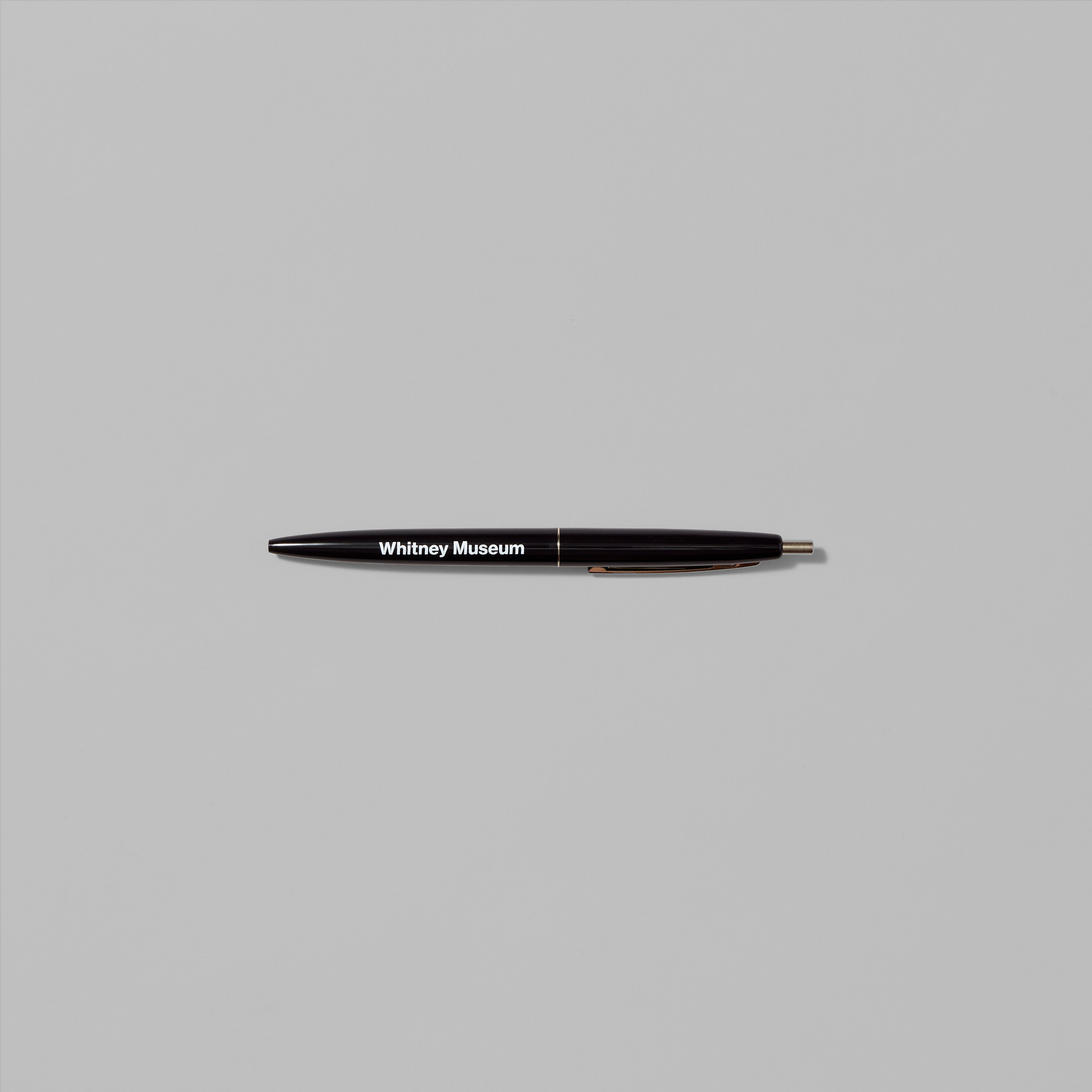 Black Whitney classic pen with Whitney Museum in white text