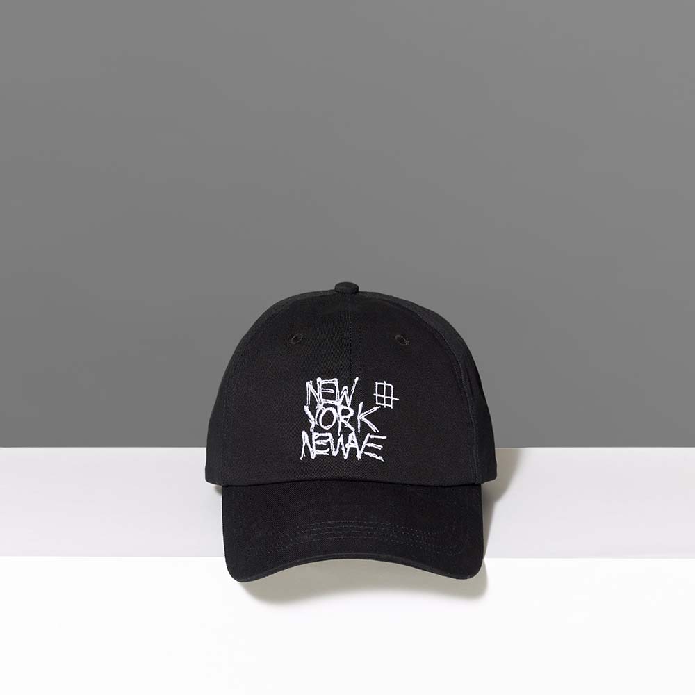 100% cotton twill black cap featuring Basquiat's New York/New Wave embroidered in white thread. 