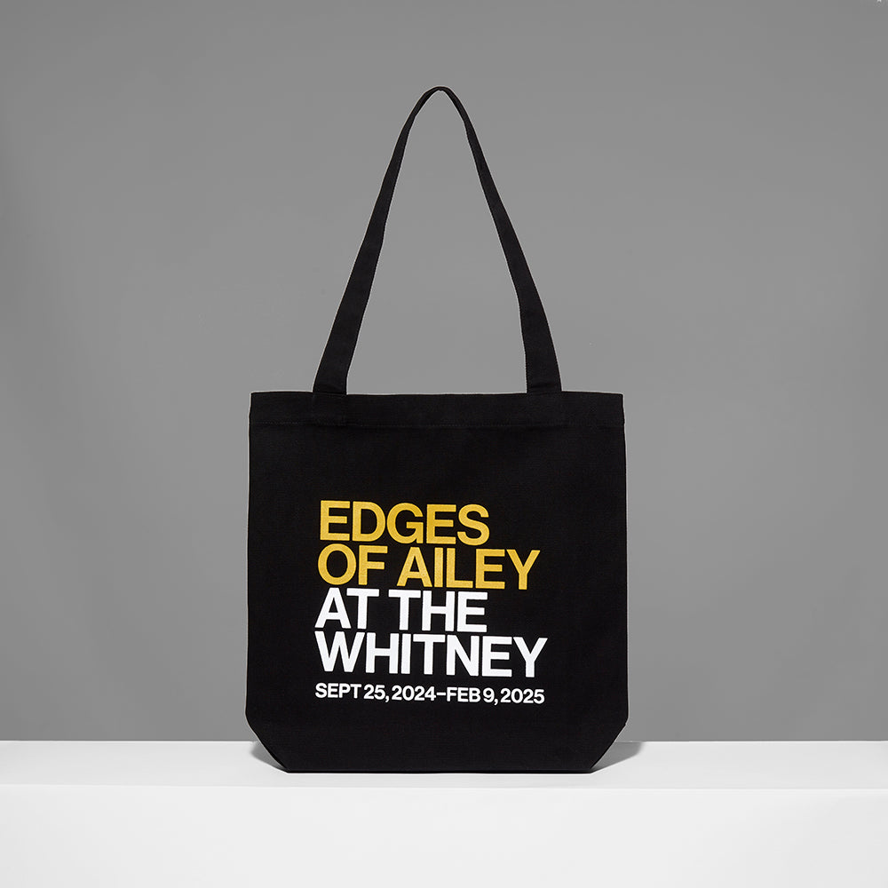 100% cotton black tote with the Edges of Ailey in yellow text and At the Whitney and exhibition dates in white text