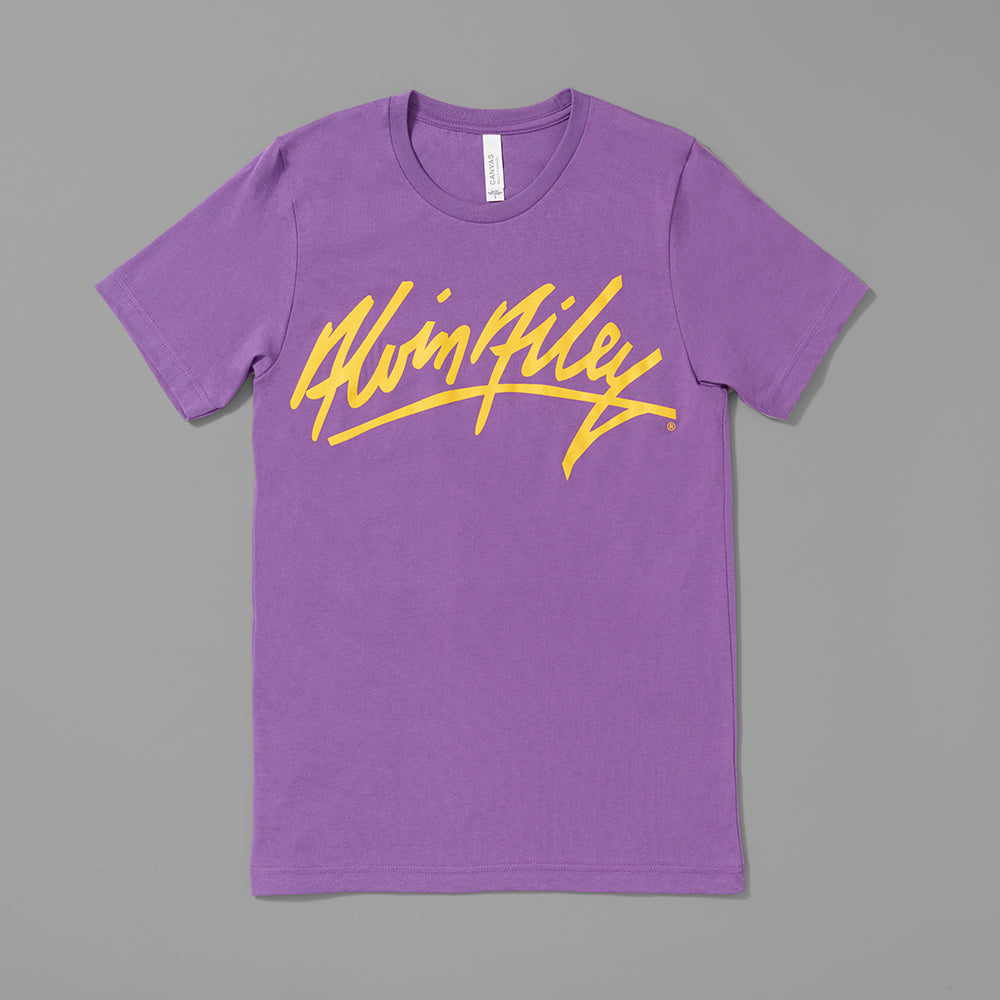 50% polyester. 25% cotton. 25% rayon purple t-shirt with the Alvin Ailey signature in yellow