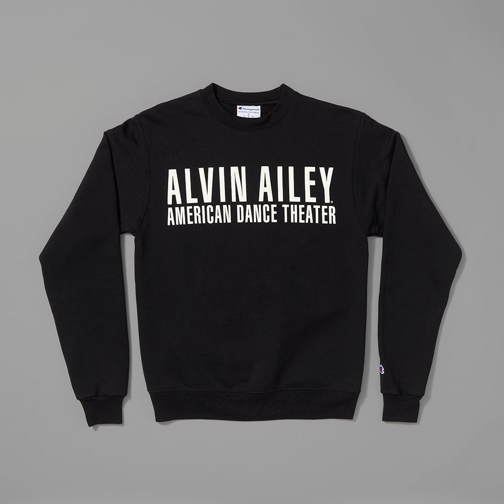 50% cotton, 50% polyester black crewneck sweatshirt with Alvin Ailey American Dance Theater in white text