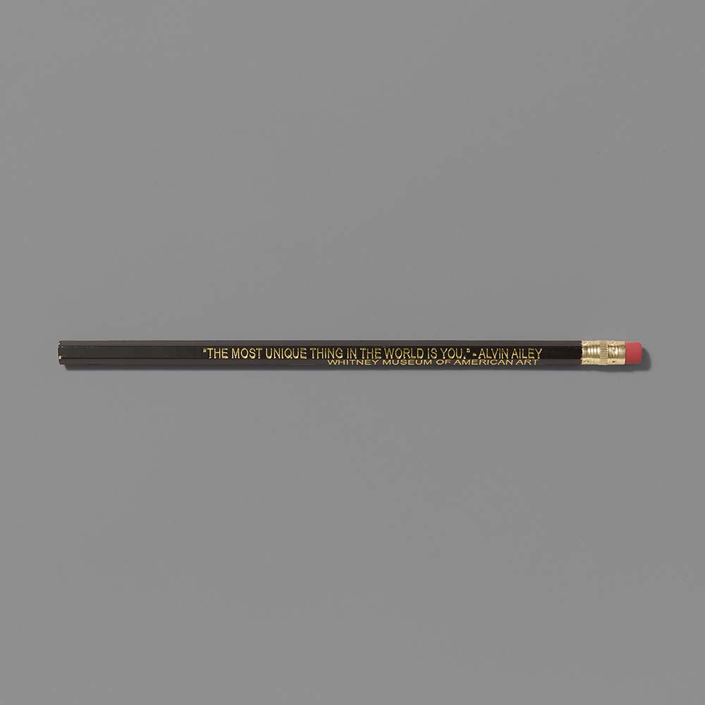 Black pencil with "The most unique thing in the world is you" Alvin Ailey in gold foil text