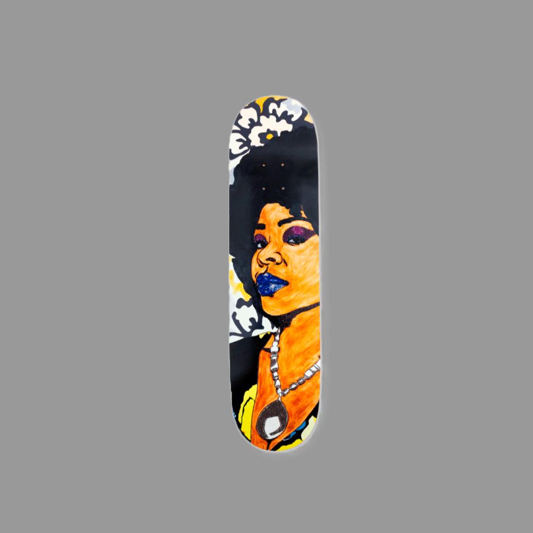 Maple wood skate deck featuring Din, une très belle négresse #2 by Mickalene Thomas. Measures 31" x 8" x .5".