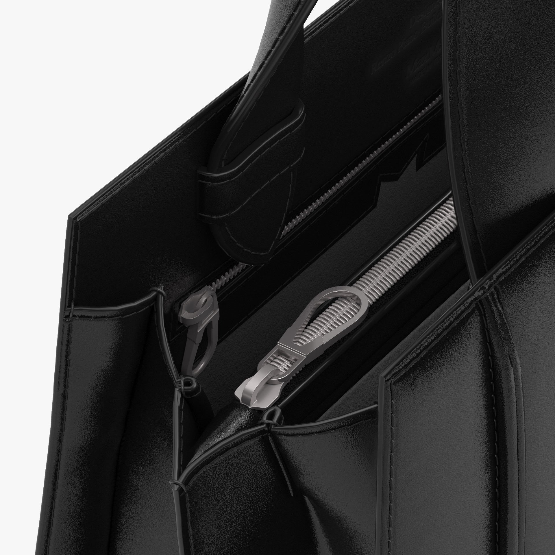 Black tote bag with silver zippers on a white background