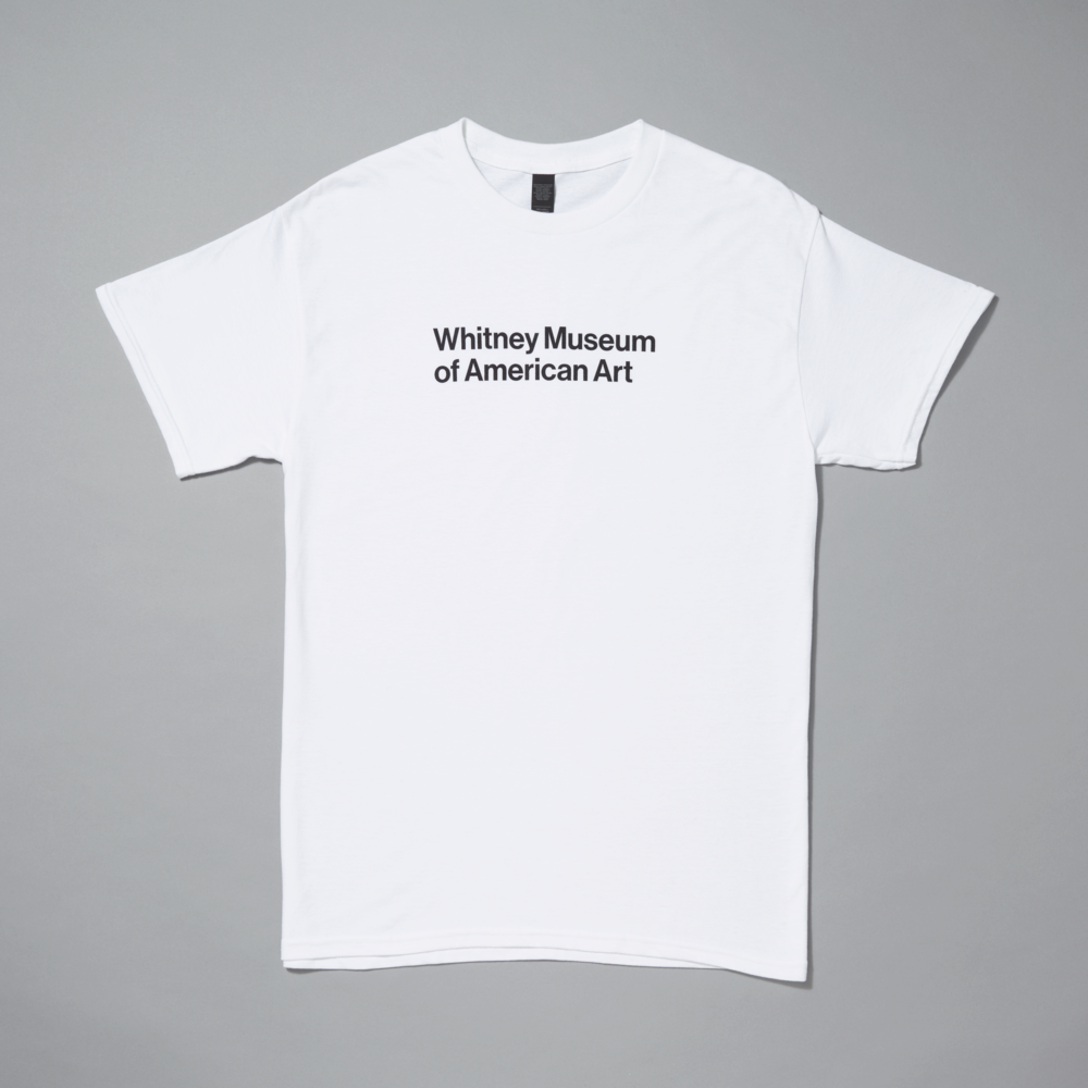 White t-shirt with 'Whitney Museum of American Art' black text on a gray background