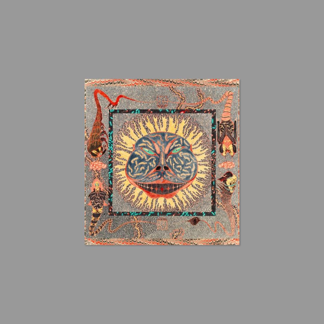Postcard featuring decorative piece with a central sun-like design surrounded by abstract elements on a gray background