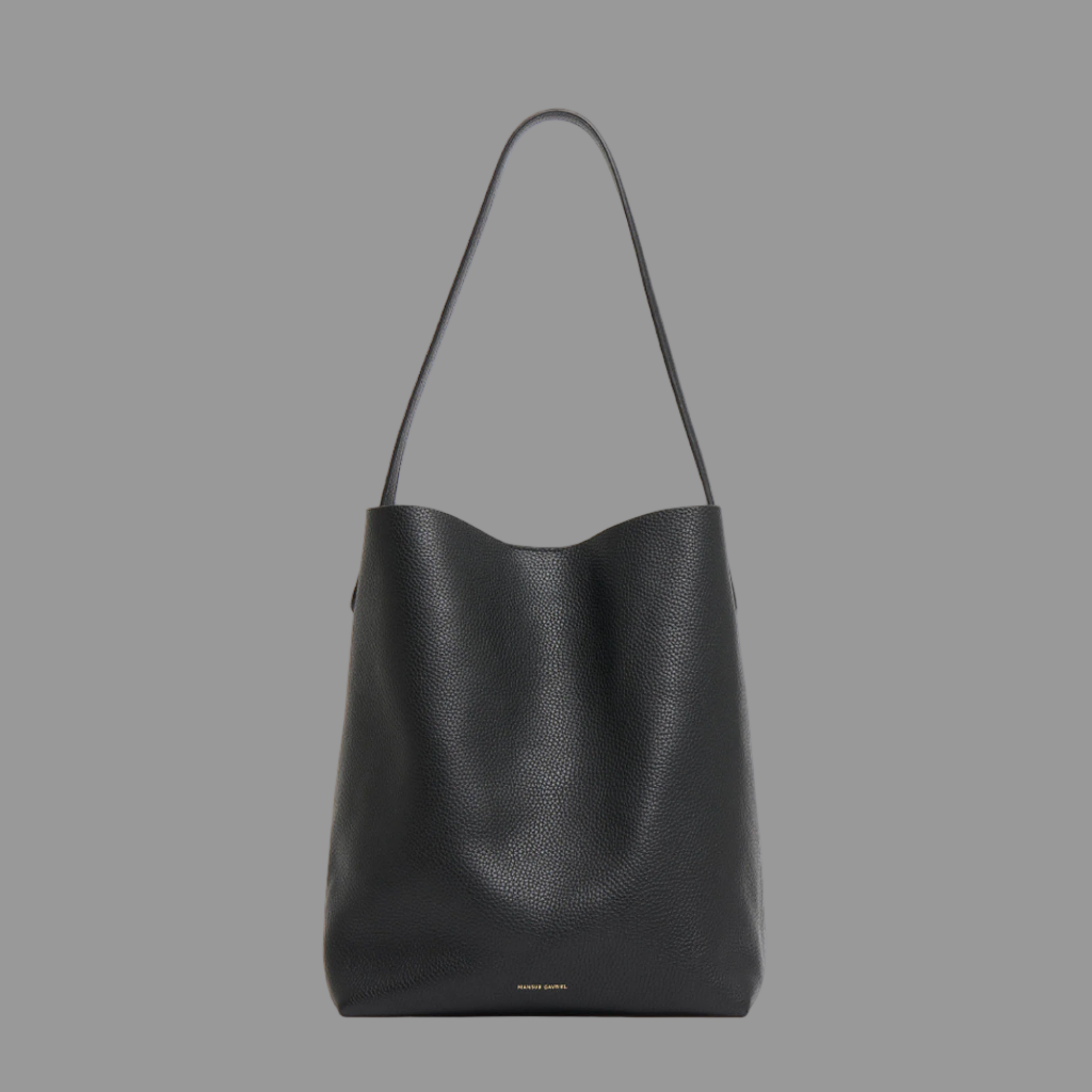 Black leather handbag on a light gray background