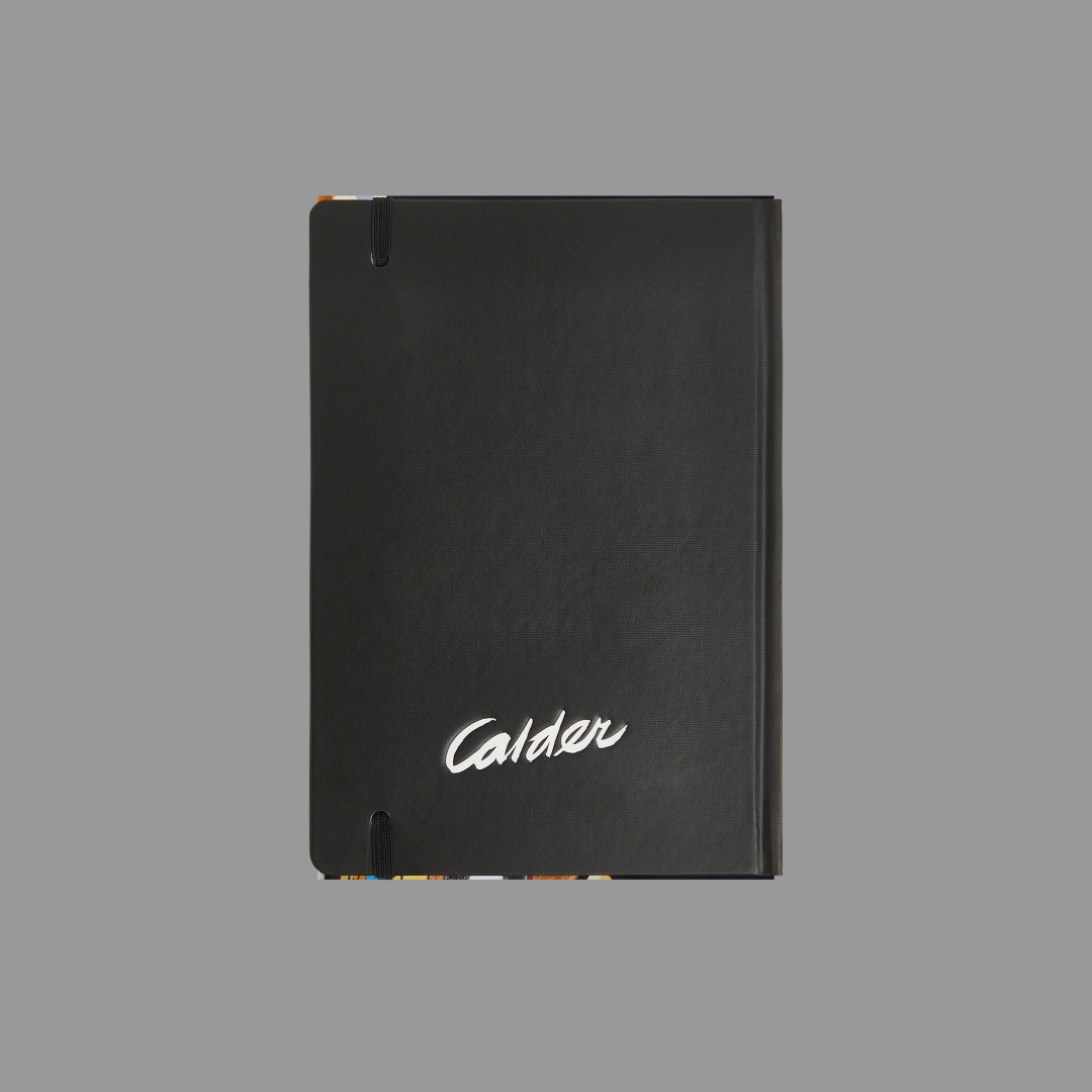 Black notebook with 'Calder' branding on a gray background