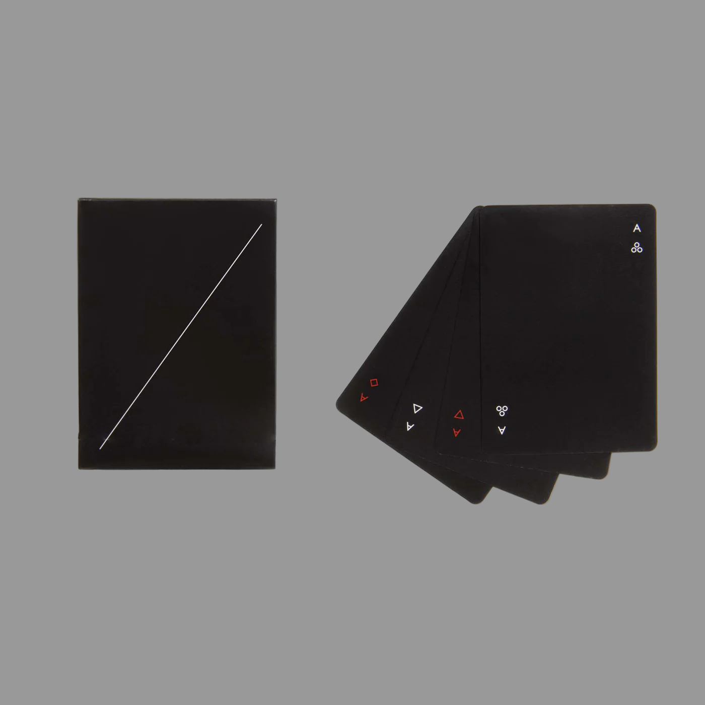 Set of black playing cards with symbols on a grey background