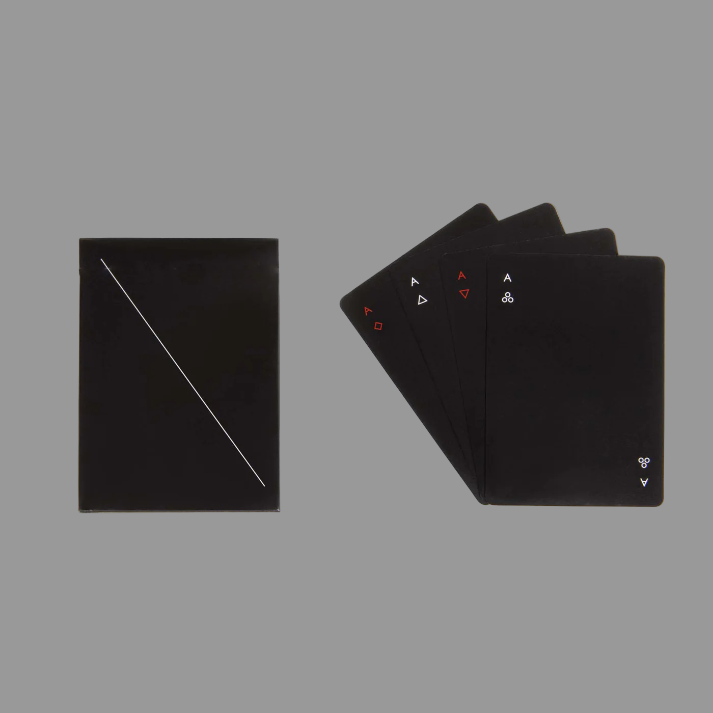 Set of black playing cards with symbols on a grey background