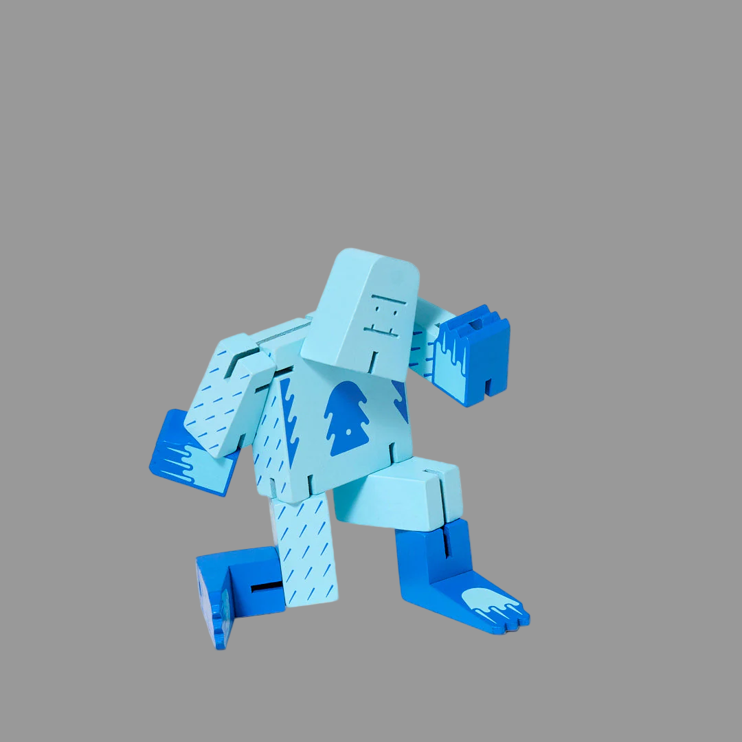 Blue robot toy on a grey background
