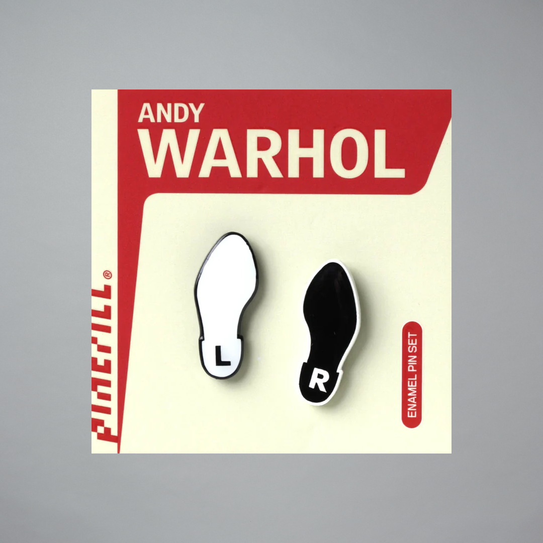 Andy Warhol Dance Diagram Pin Set with black and white dress shoes on Andy Warhol packaging