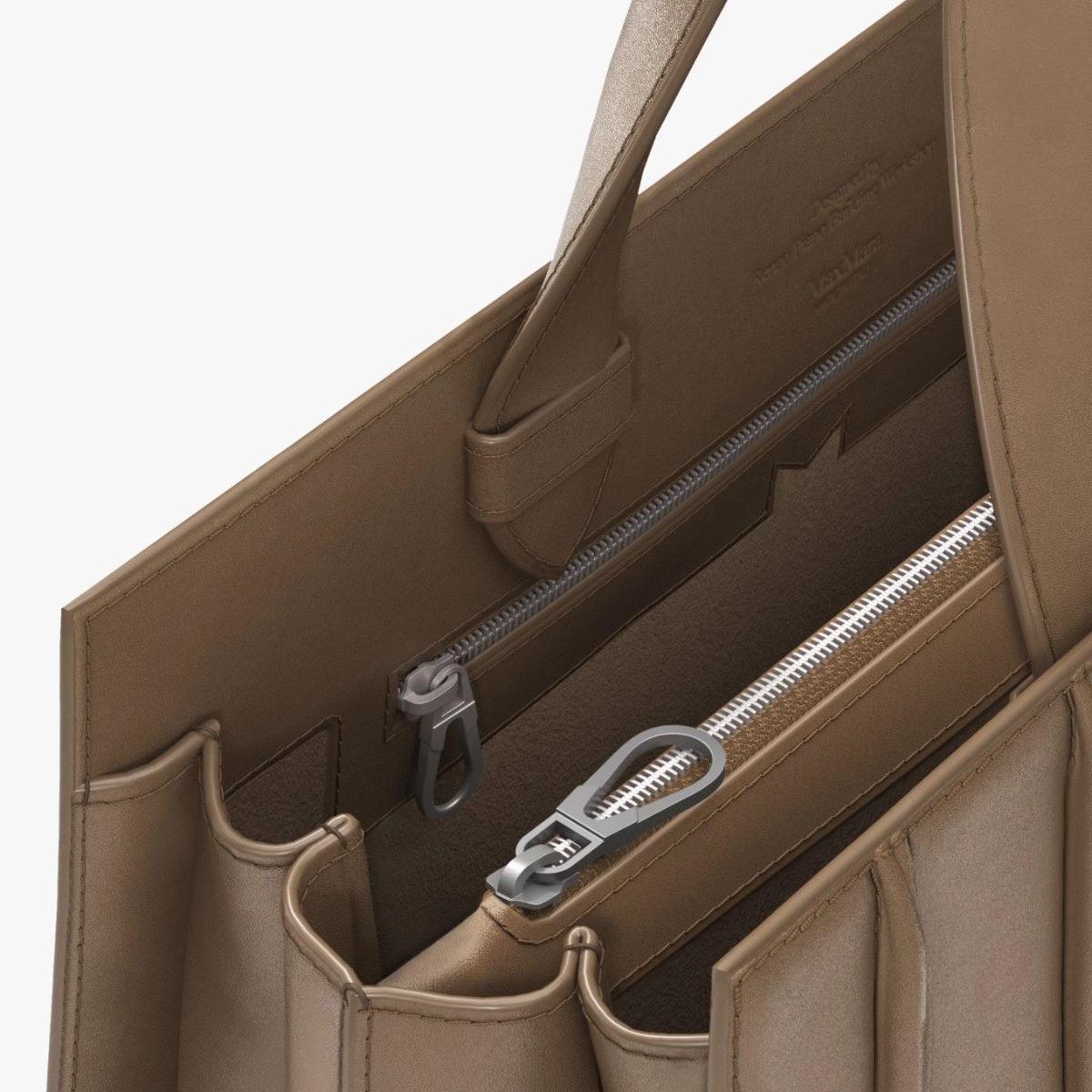 Close-up of a camel leather bag with a silver zipper pocket on a white background