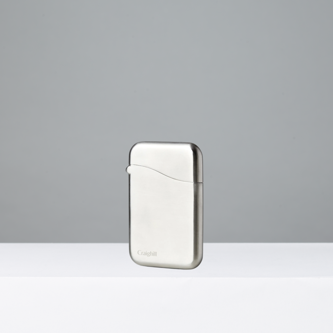 Stainless steel card case on a gray background
