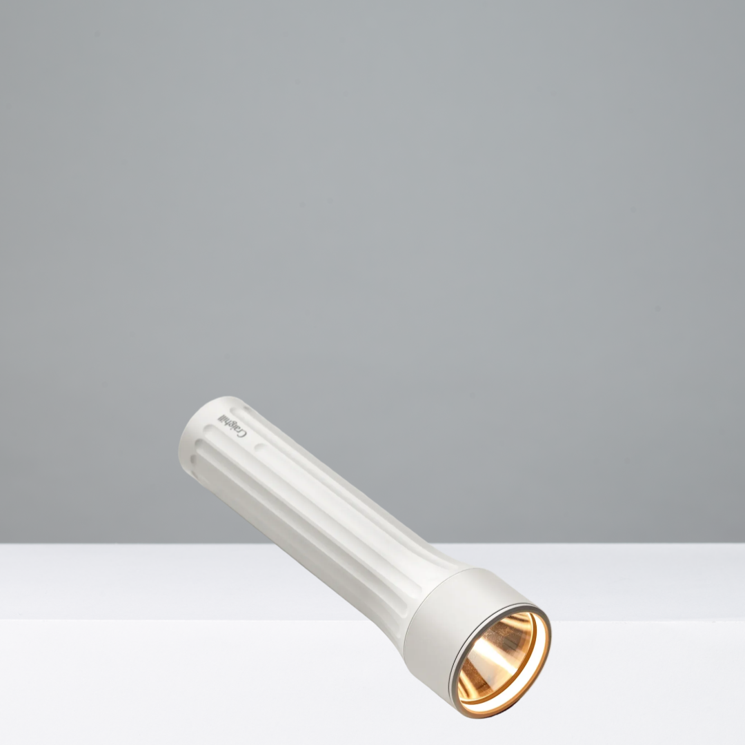 White flashlight fixture on a gray background