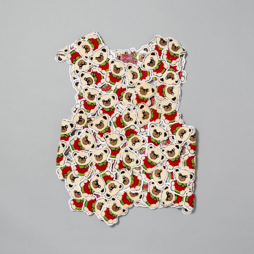 Vest featuring bear patches on a gray background