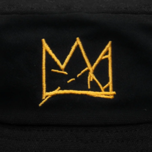 Black bucket hat with yellow crown logo on a gray background