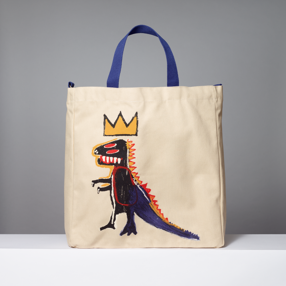 Tote bag featuring Jean-Michel Basquiat's Pez Dispenser on a gray background