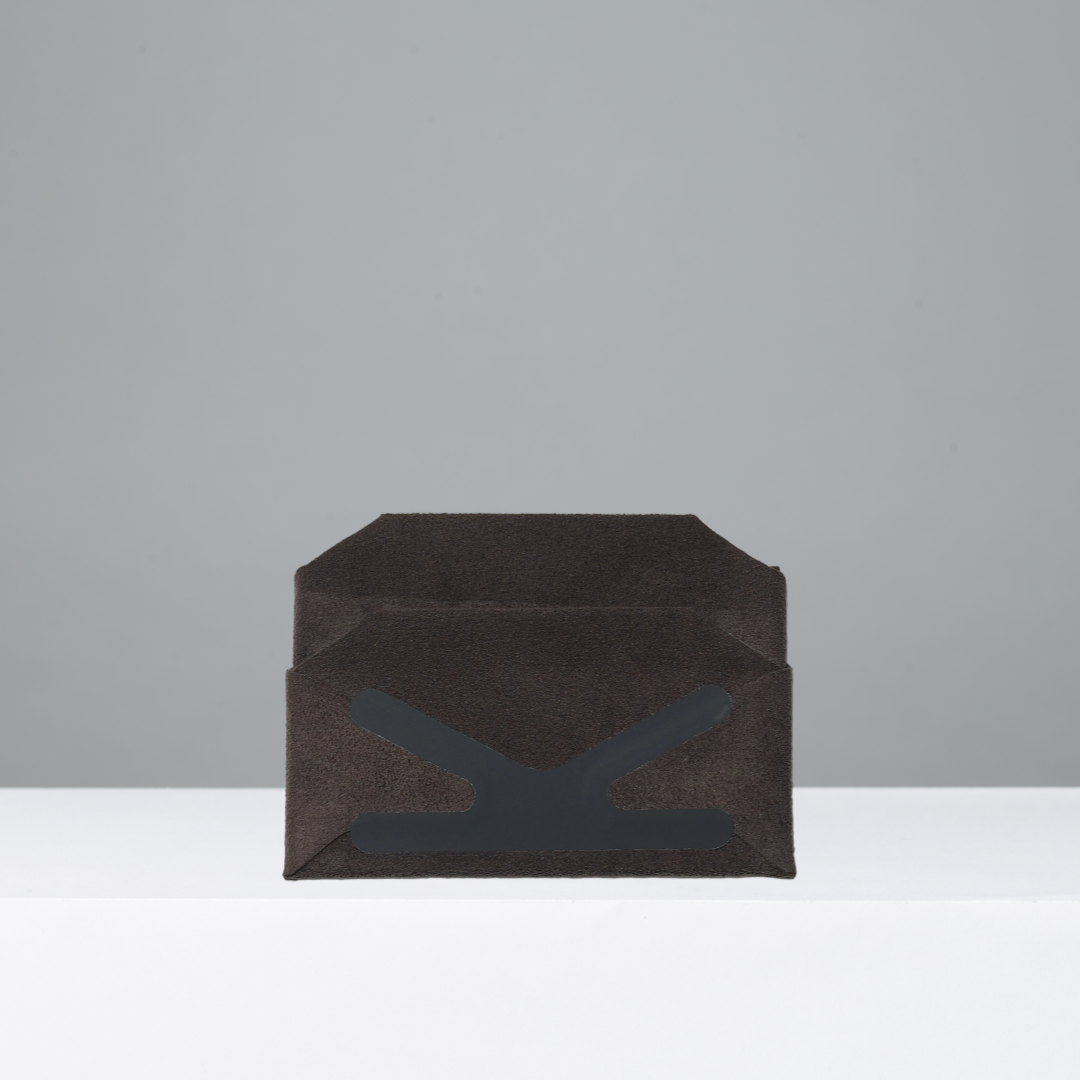 Card wallet of coffee brown ultrasuede.