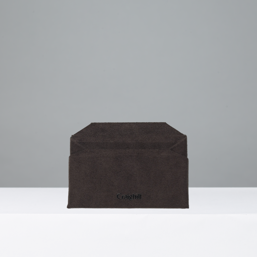 Card wallet of coffee brown ultrasuede, featuring the brand 'Craighill'.