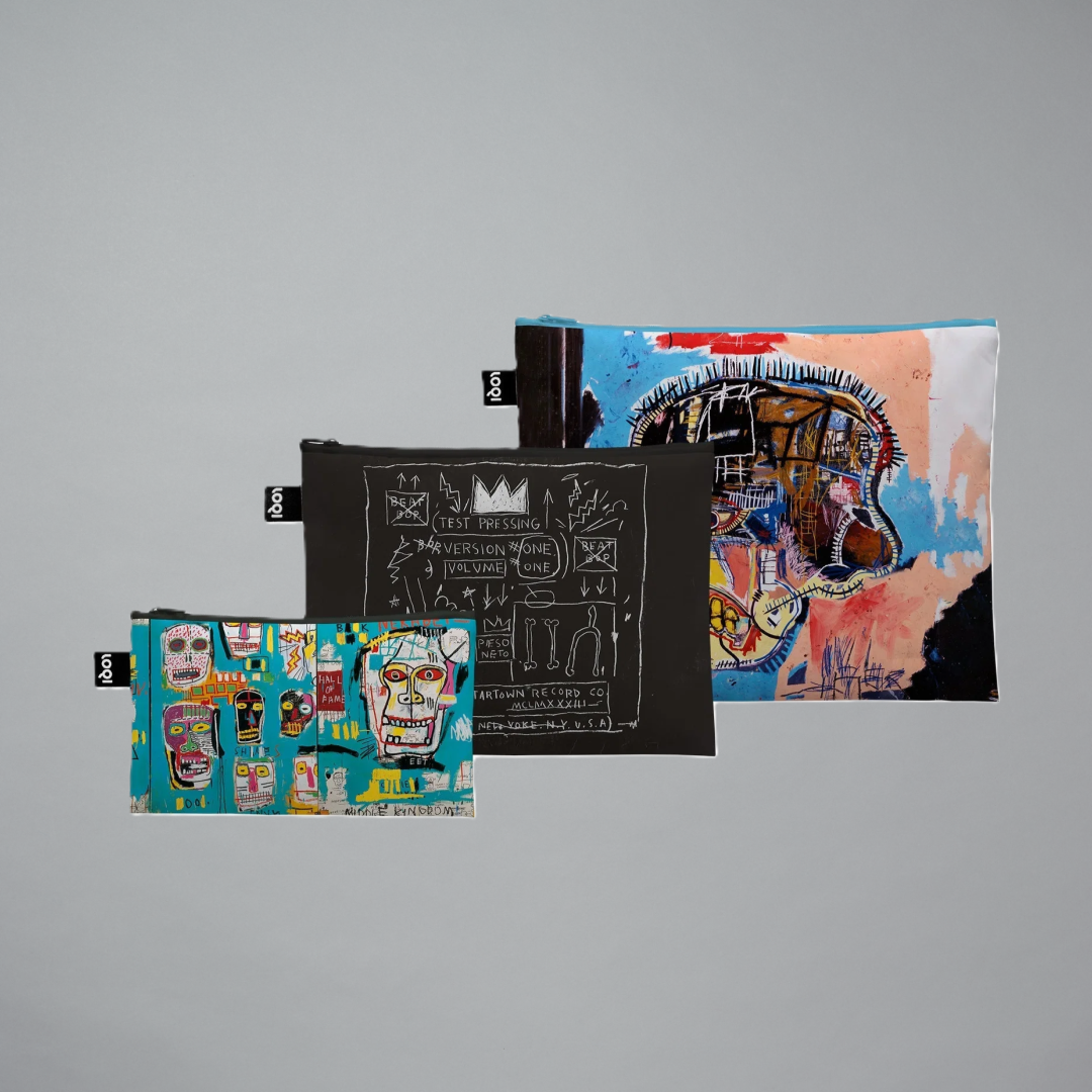 Set of three recycled pouches featuring artwork designs by Jean-Michel Basquiat on a gray background