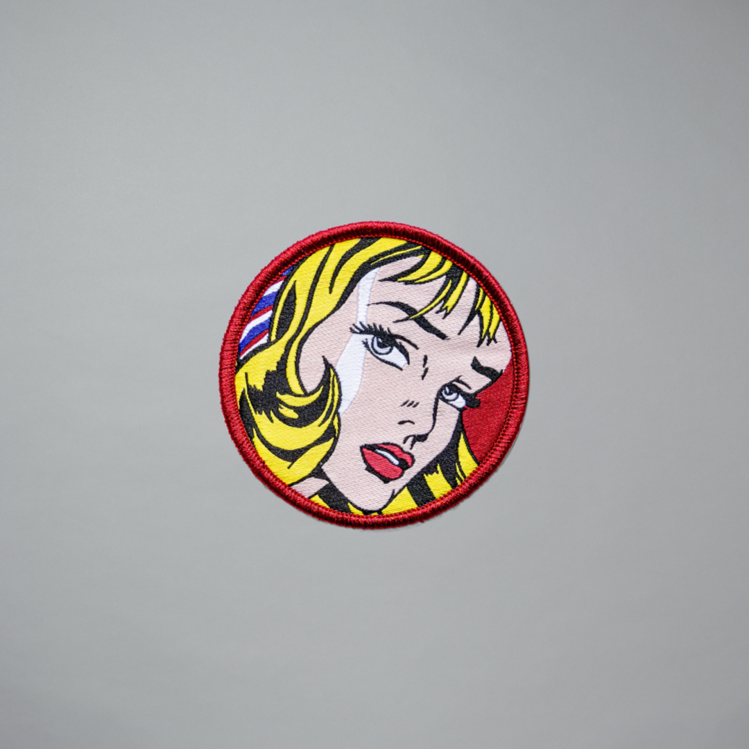 Embroidered patch featuring Girl with Hair Ribbon by Roy Lichtenstein