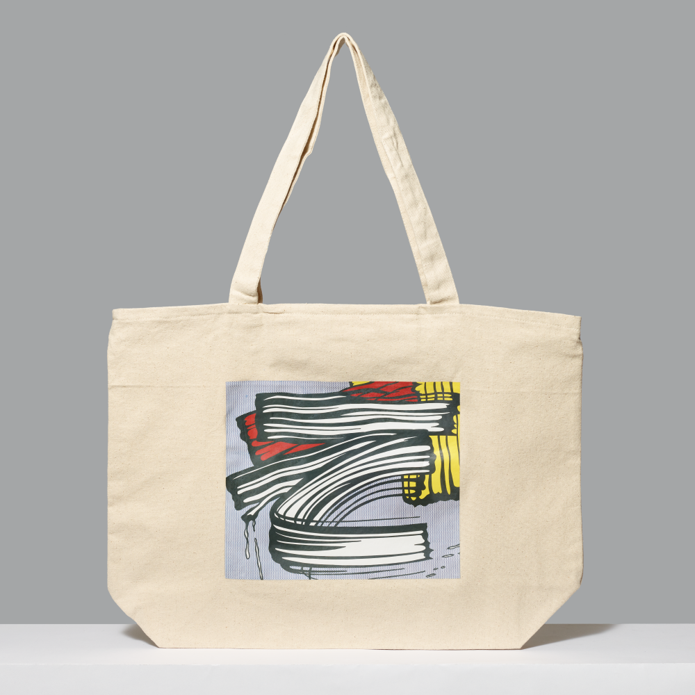 Beige canvas tote bag featuring Roy Lichtenstein's Little Big Painting against a gray background