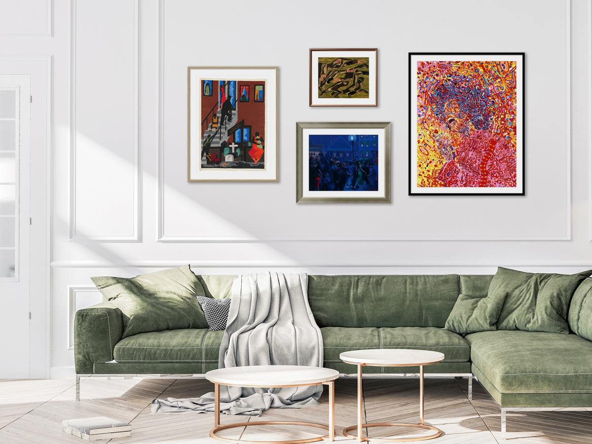 A living room space with framed custom prints hanging on wall