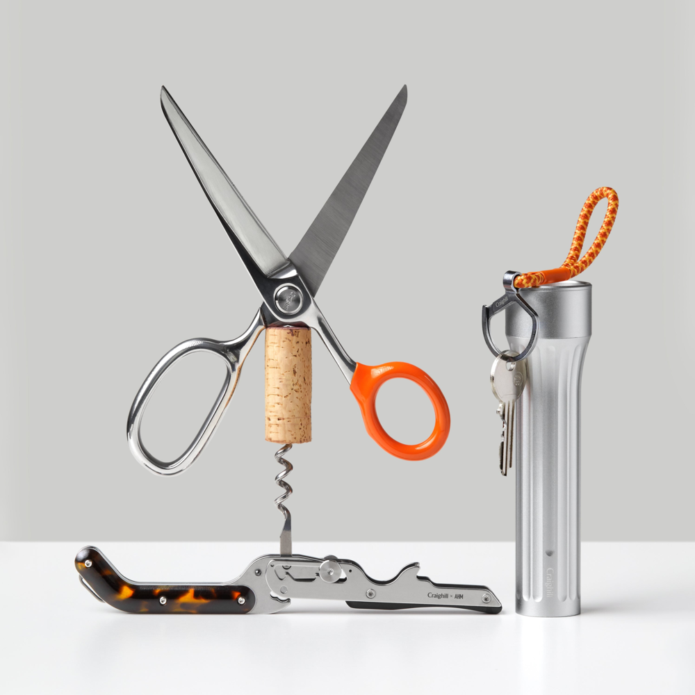 Assortment of tools and objects by Craighill, including scissors, wine key, split ring, and flashlight